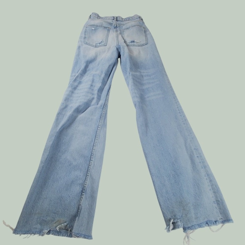 Light Wash High Waisted Wide Leg Distressed Jeans with Frayed Hem